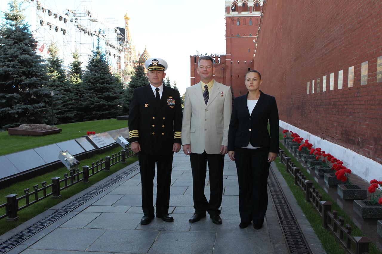 2612:  Expedition 41/42 Flight Engineer Barry Wilmore of NASA (left), Soyuz Commander Alexander Samokutyaev of the Russian Federal Space Agency (Roscosmos, center) and Elena Serova of Roscosmos (right) pose for pictures at the Kremlin Wall in Moscow’s Red Square Sept. 5 where they laid flowers at the sites where Russian space icons are interred in a traditional ceremony. The trio will launch from the Baikonur Cosmodrome in Kazakhstan on Sept. 26, Kazakh time, in their Soyuz TMA-14M spacecraft for a 5 ½ month mission on the International Space Station. Serova will become the fourth Russian woman to fly in space and the first Russian woman to conduct a long duration mission on the station.   NASA/Stephanie Stoll 