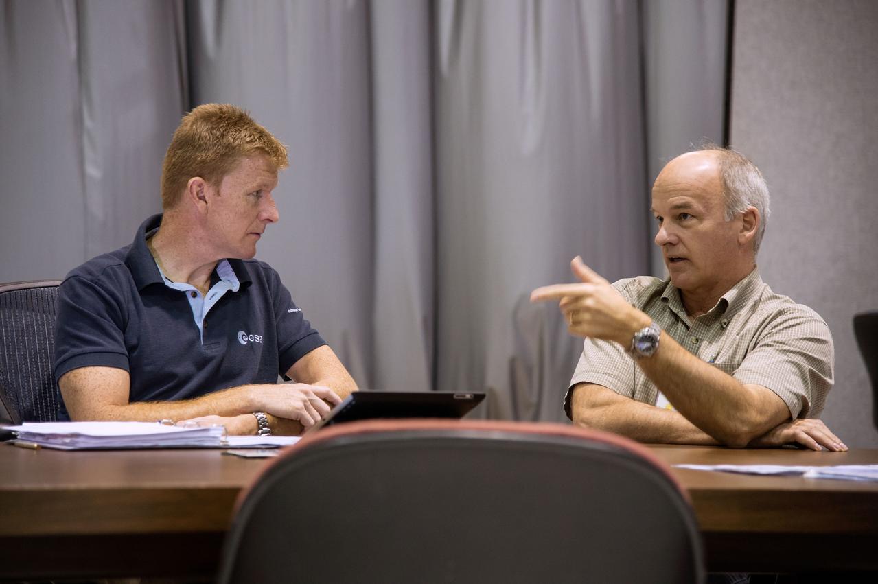 PHOTO DATE:  09-08-14 LOCATION:  Building 16N/1040 - SES Alpha-Cupola  SUBJECT: ESA Astronaut Timothy Peake on behalf of ESA prior to FF RNDZ ADV 3 training with Kopra and Wilmore. PHOTOGRAPHER: BILL STAFFORD
