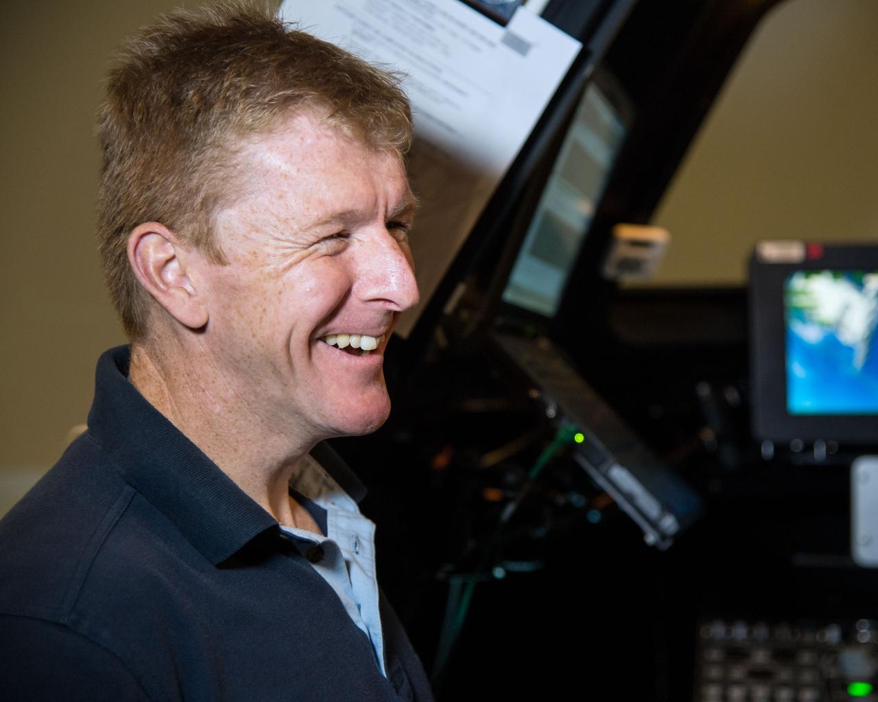 PHOTO DATE:  09-08-14 LOCATION:  Building 16N/1040 - SES Alpha-Cupola  SUBJECT: ESA Astronaut Timothy Peake on behalf of ESA prior to FF RNDZ ADV 3 training with Kopra and Wilmore. PHOTOGRAPHER: BILL STAFFORD