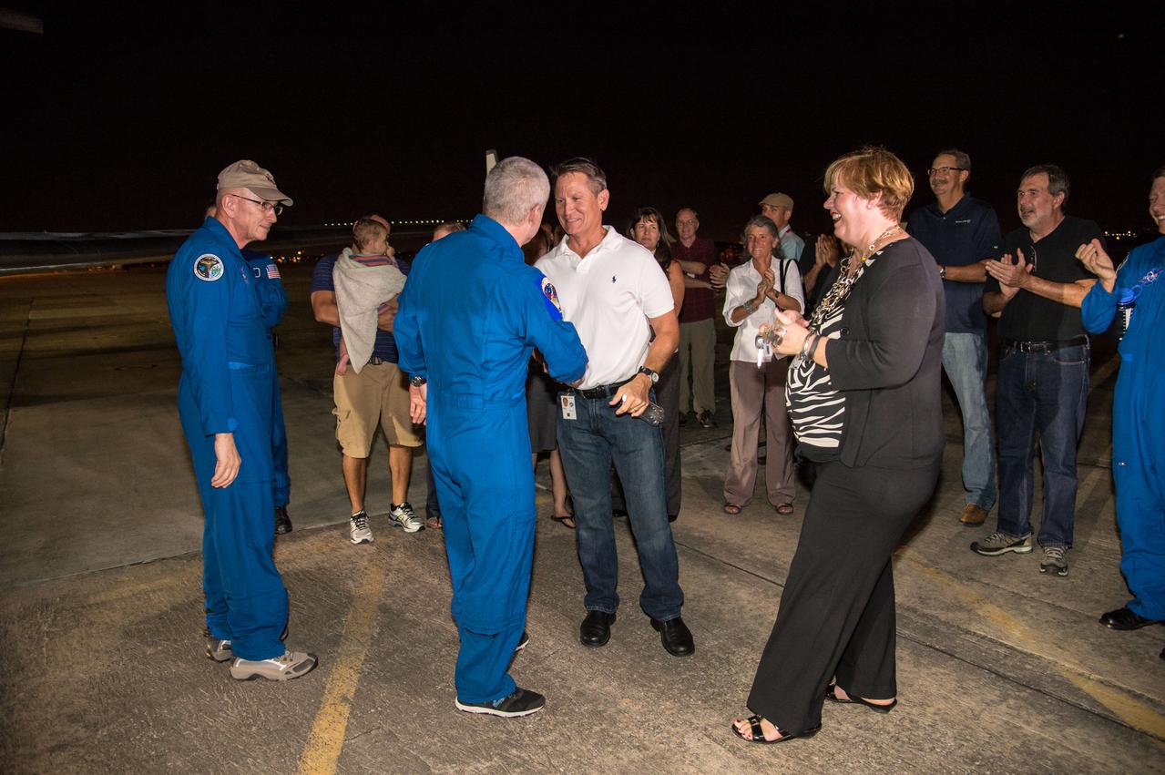 Expedition 40 crew member Steve Swanson during his arrival at Ellington Field. Photo Date: September 11, 2014. Location: Ellington Field. Photographer: Robert Markowitz