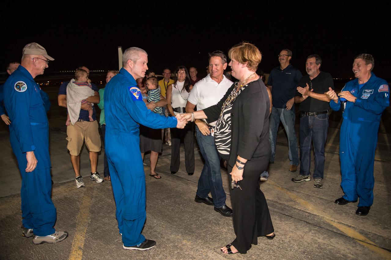 Expedition 40 crew member Steve Swanson during his arrival at Ellington Field. Photo Date: September 11, 2014. Location: Ellington Field. Photographer: Robert Markowitz