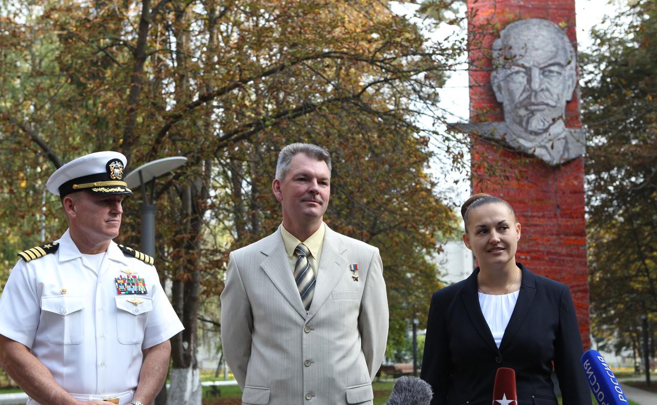 3036:  With the statue of Vladimir Lenin behind them, Expedition 41/42 Flight Engineer Barry Wilmore of NASA (left), Soyuz Commander Alexander Samokutyaev of the Russian Federal Space Agency (Roscosmos, center) and Flight Engineer Elena Serova of Roscosmos (right) pose for pictures Sept. 12 at the Gagarin Cosmonaut Training Center in Star City, Russia before flying to their launch site at the Baikonur Cosmodrome in Kazakhstan for final pre-launch training. The trio will launch from Baikonur on Sept. 26, Kazakh time, in their Soyuz TMA-14M spacecraft for a 5 ½ month mission on the International Space Station. Serova will become the fourth Russian woman to fly in space.  NASA/Stephanie Stoll 