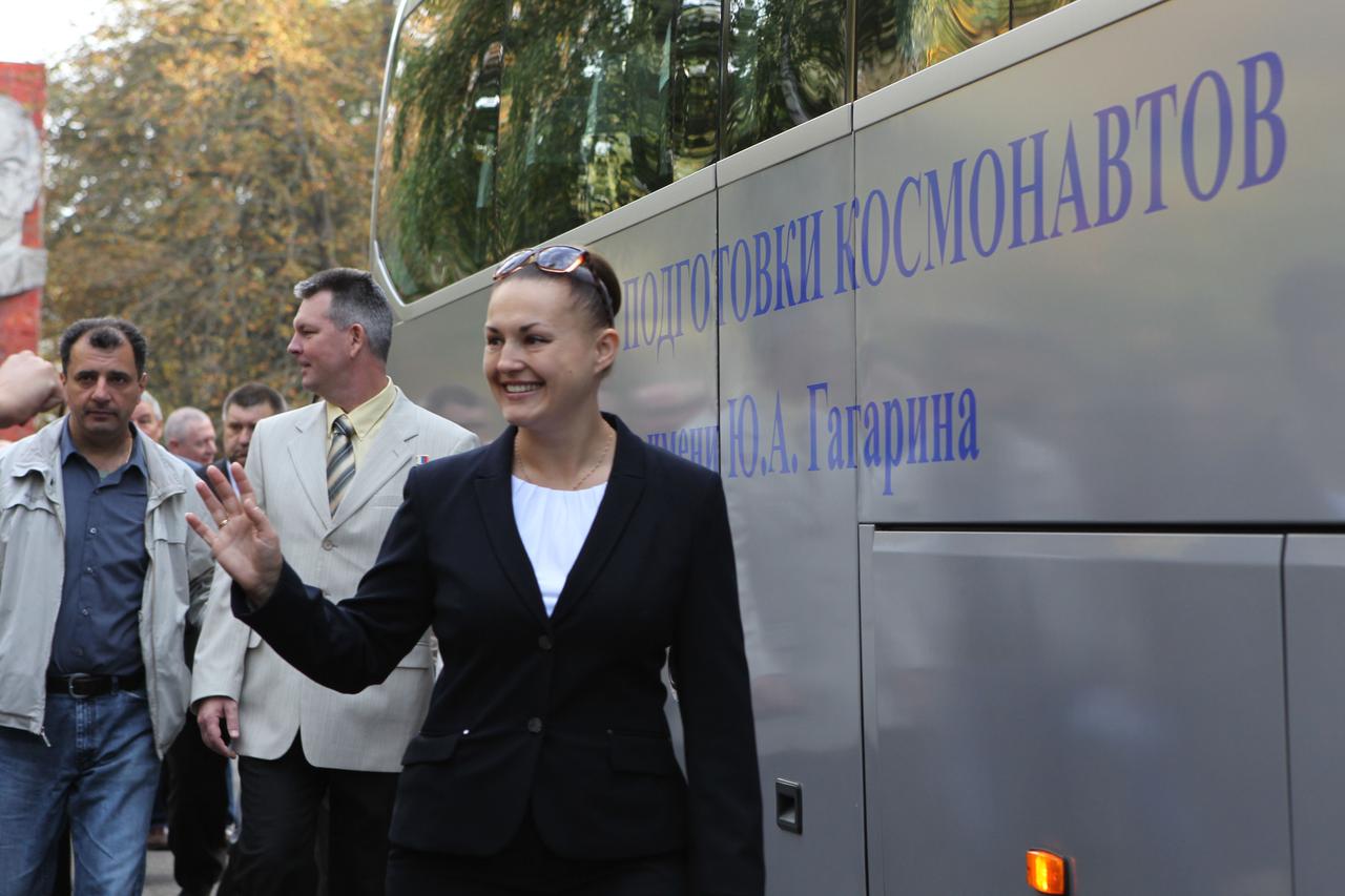 3108:  At the Gagarin Cosmonaut Training Center in Star City, Russia, Expedition 41/42 Flight Engineer Elena Serova of the Russian Federal Space Agency (Roscosmos) waves goodbye to well-wishers Sept. 12 before departing for the launch site at the Baikonur Cosmodrome in Kazakhstan for final pre-launch training. Serova, Soyuz Commander Alexander Samokutyaev of Roscosmos (behind Serova) and NASA Flight Engineer Barry Wilmore will launch from Baikonur on Sept. 26, Kazakh time, in their Soyuz TMA-14M spacecraft for a 5 ½ month mission on the International Space Station. Serova will become the fourth Russian woman to fly in space.  NASA/Stephanie Stoll 