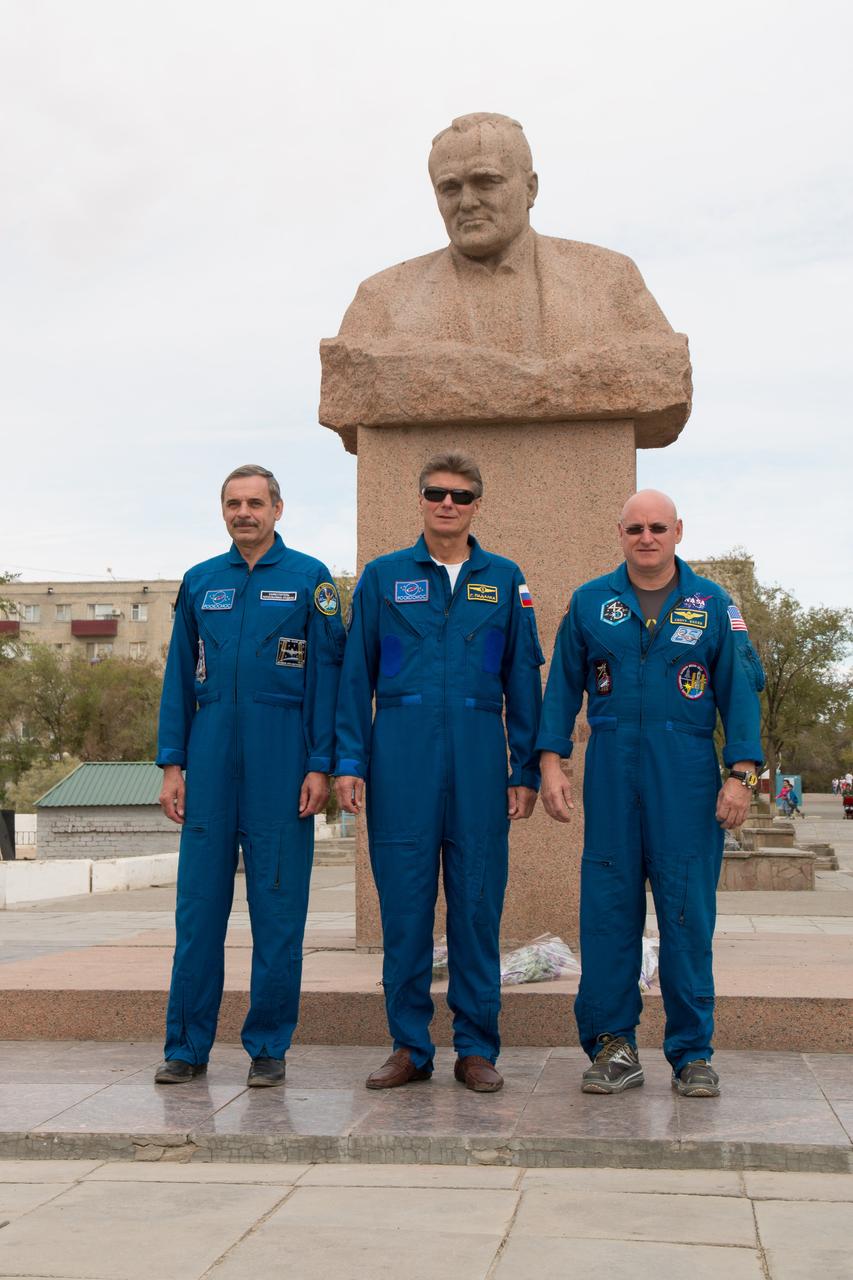 14-12-25-35: (14 Sept. 2014) --- The Expedition 41/42 backup crewmembers pose for pictures in front of the statue of Russian space icon Sergei Korolev during a tour of Baikonur, Kazakhstan Sept. 14. From left to right are Mikhail Kornienko of the Russian Federal Space Agency (Roscosmos), Gennady Padalka of Roscosmos and Scott Kelly of NASA. Kelly and Kornienko will launch from Baikonur in March 2015 to spend a full year on the International Space Station. They are backups to Barry Wilmore of NASA, Alexander Samokutyaev of the Russian Federal Space Agency (Roscosmos) and Elena Serova of Roscosmos. Wilmore, Samokutyaev and Serova will launch on Sept. 26, Kazakh time, in the Soyuz TMA-14M spacecraft to begin a 5 ½ month mission on the station. Serova will become the fourth Russian woman to fly in space. Photo credit: NASA/Victor Zelentsov