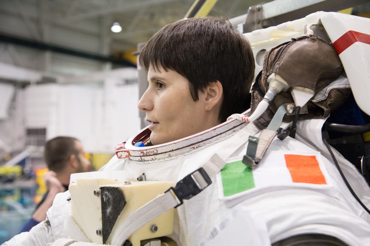Expedition 42/43 (Soyuz 41S) crew member and ESA astronaut Samantha Cristoforetti during ISS EVA Maintenance 9 (Maintenance 8) along with Astronaut Jeanette Epps.  Photo Date: September 16, 2014.  Location: NBL - Pool Topside.  Photographer: Robert Markowitz