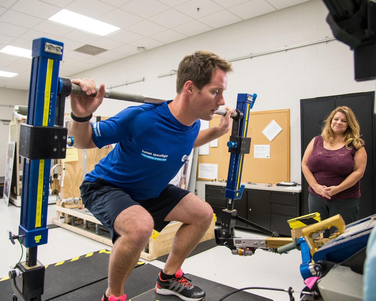 ESA Astronaut Thomas Pesquet during CMS ARED OPS training with instructor Kimberlee Jadwick .  Photo Date: September 16, 2014.  Location: Building 26.  Photographer: Robert Markowitz