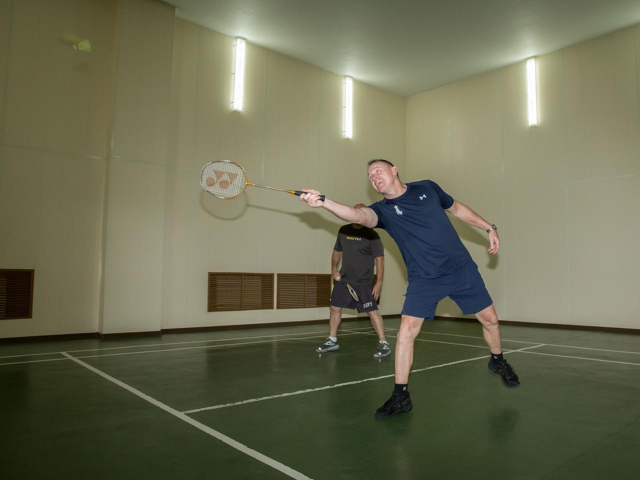 17-13-20-00-4:  (17 Sept. 2014) --- At the Cosmonaut Hotel crew quarters in Baikonur, Kazakhstan, Expedition 41 Flight Engineer Barry Wilmore of NASA  tries his hand at a game of badminton Sept. 17 as he and his crewmates prepare for their upcoming launch. Wilmore,  Soyuz Commander Alexander Samokutyaev of the Russian Federal Space Agency (Roscosmos) and Flight Engineer Elena Serova of Roscosmos are scheduled to launch from the Baikonur Cosmodrome Sept. 26, Kazakh time, in the Soyuz TMA-14M spacecraft for a 5 ½ month mission on the International Space Station. Serova will become the fourth Russian woman to fly in space and the first Russian woman to live and work on the station.  Photo credit:  NASA/Victor Zelentsov 