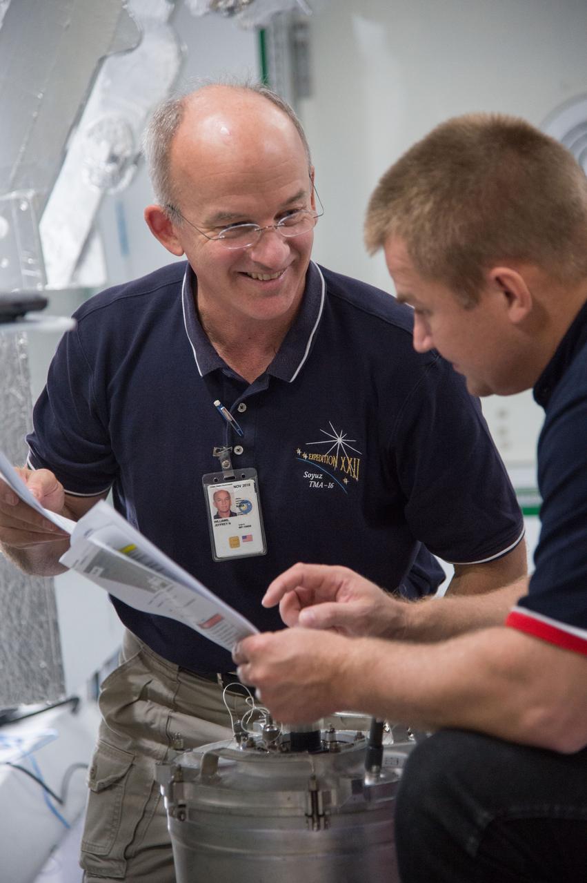DATE: 9-24-14 LOCATION: Bldg. 9NW - ISS Mockups. SUBJECT: Expedition 48 crew members (Soyuz 46) Aleksey Ovchinin, Oleg Skripochka and Jeff Williams during Routine Ops training in Space Vehicle Mockup Training Facilities (SVMTF) ISS mockups with instructor John Ray. PHOTOGRAPHER: Lauren Harnett