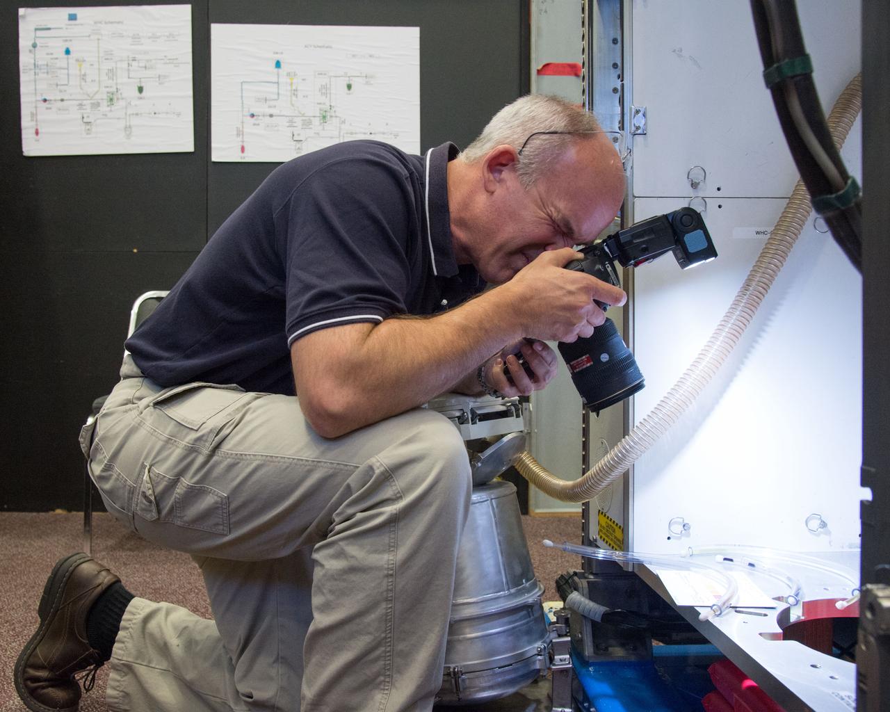DATE: 9-24-14 LOCATION: Bldg. 9NW - ISS Mockups. SUBJECT: Expedition 48 crew members (Soyuz 46) Aleksey Ovchinin, Oleg Skripochka and Jeff Williams during Routine Ops training in Space Vehicle Mockup Training Facilities (SVMTF) ISS mockups with instructor John Ray. PHOTOGRAPHER: Lauren Harnett