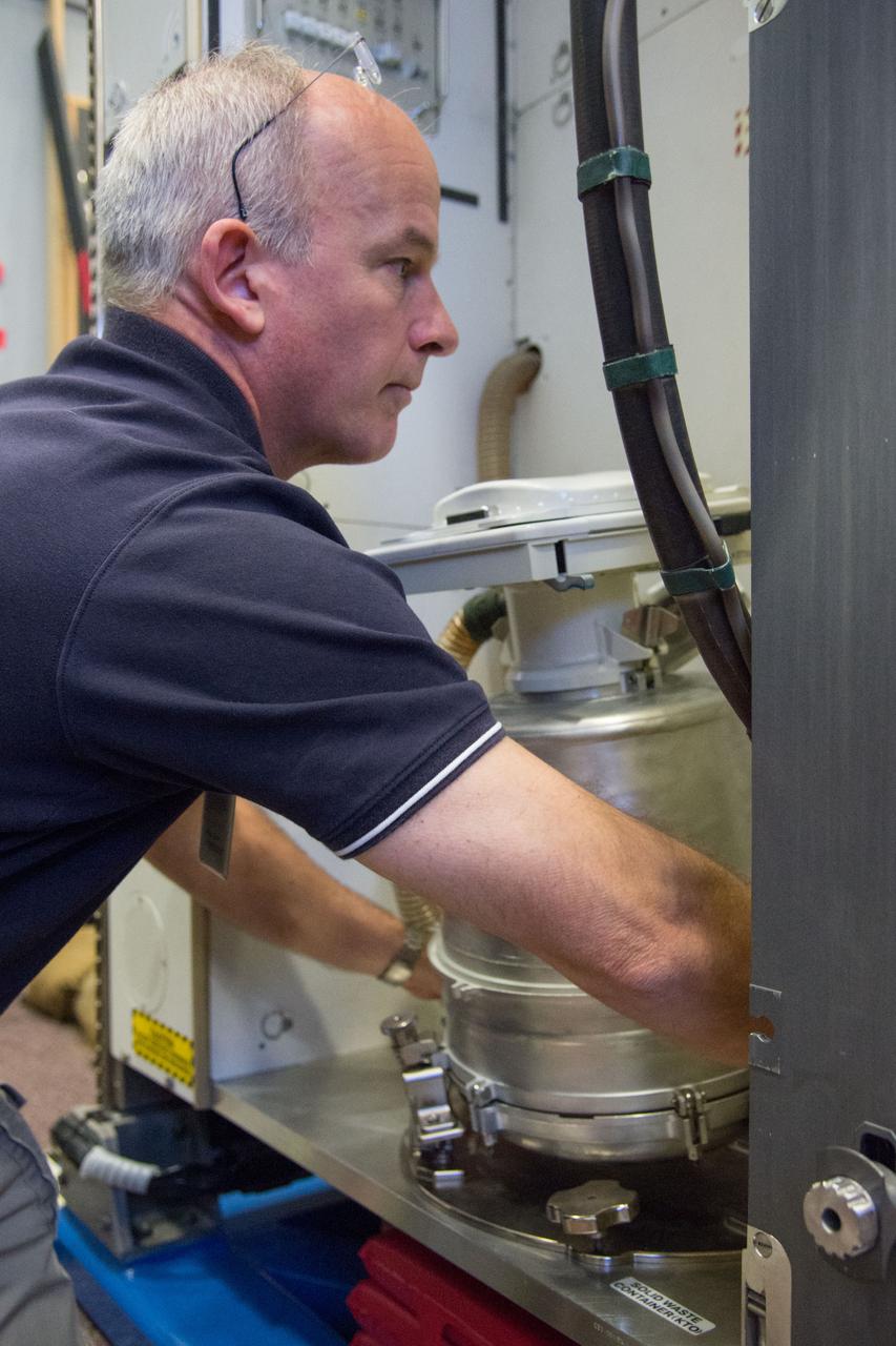 DATE: 9-24-14 LOCATION: Bldg. 9NW - ISS Mockups. SUBJECT: Expedition 48 crew members (Soyuz 46) Aleksey Ovchinin, Oleg Skripochka and Jeff Williams during Routine Ops training in Space Vehicle Mockup Training Facilities (SVMTF) ISS mockups with instructor John Ray. PHOTOGRAPHER: Lauren Harnett