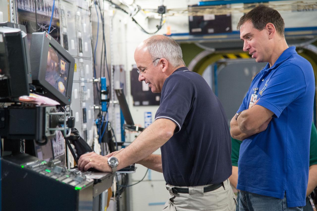 DATE: 9-24-14 LOCATION: Bldg. 9NW - ISS Mockups. SUBJECT: Expedition 48 crew members (Soyuz 46) Aleksey Ovchinin, Oleg Skripochka and Jeff Williams during Routine Ops training in Space Vehicle Mockup Training Facilities (SVMTF) ISS mockups with instructor John Ray. PHOTOGRAPHER: Lauren Harnett