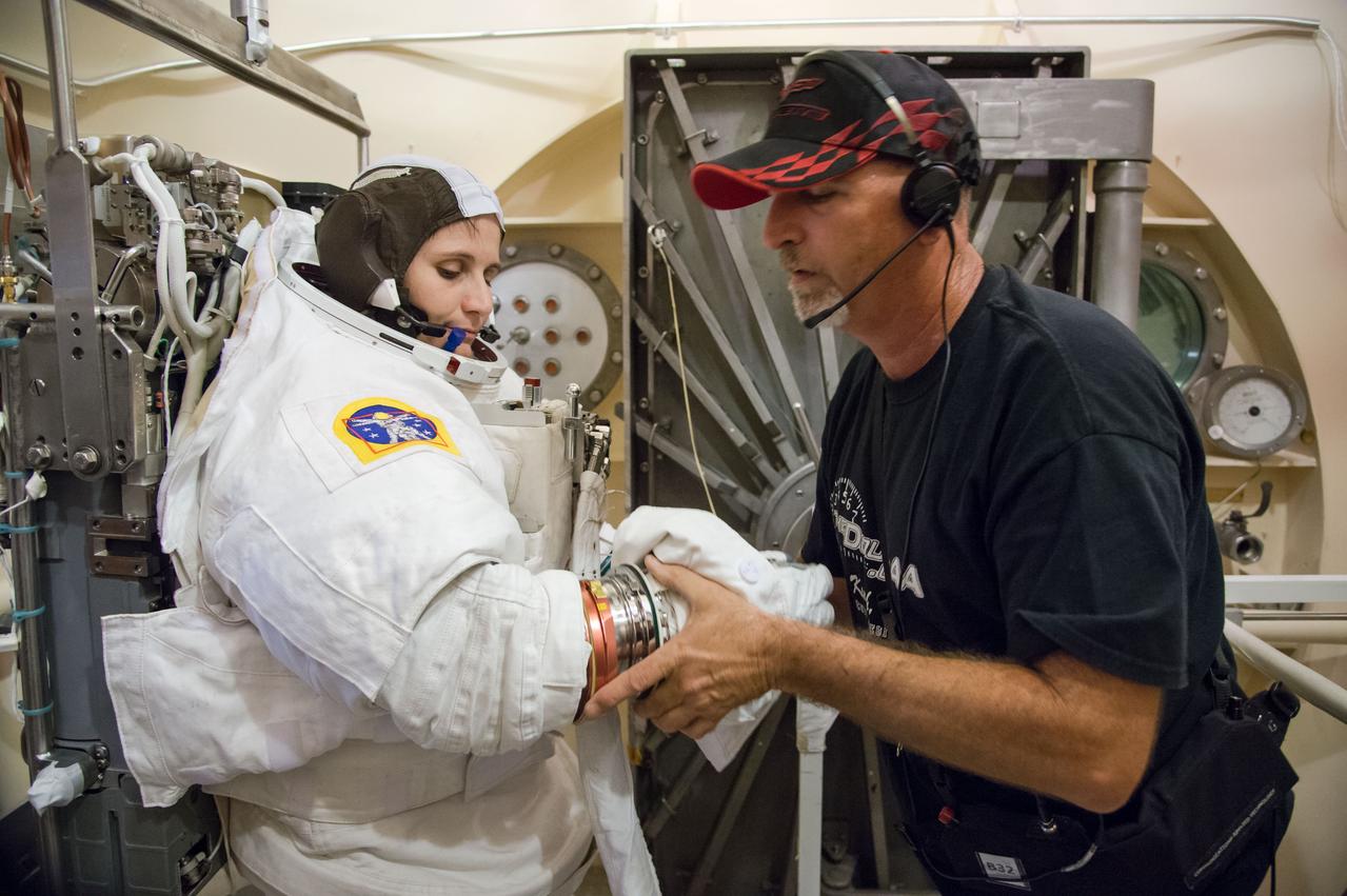Expedition 42/43 ESA astronaut Samantha Cristoforetti during preparations for EMU Certification Altitude Run.  Photo Date: September 22, 2014.  Location: Bldg. 7, 11 foot chamber.  Photographer: Robert Markowitz  