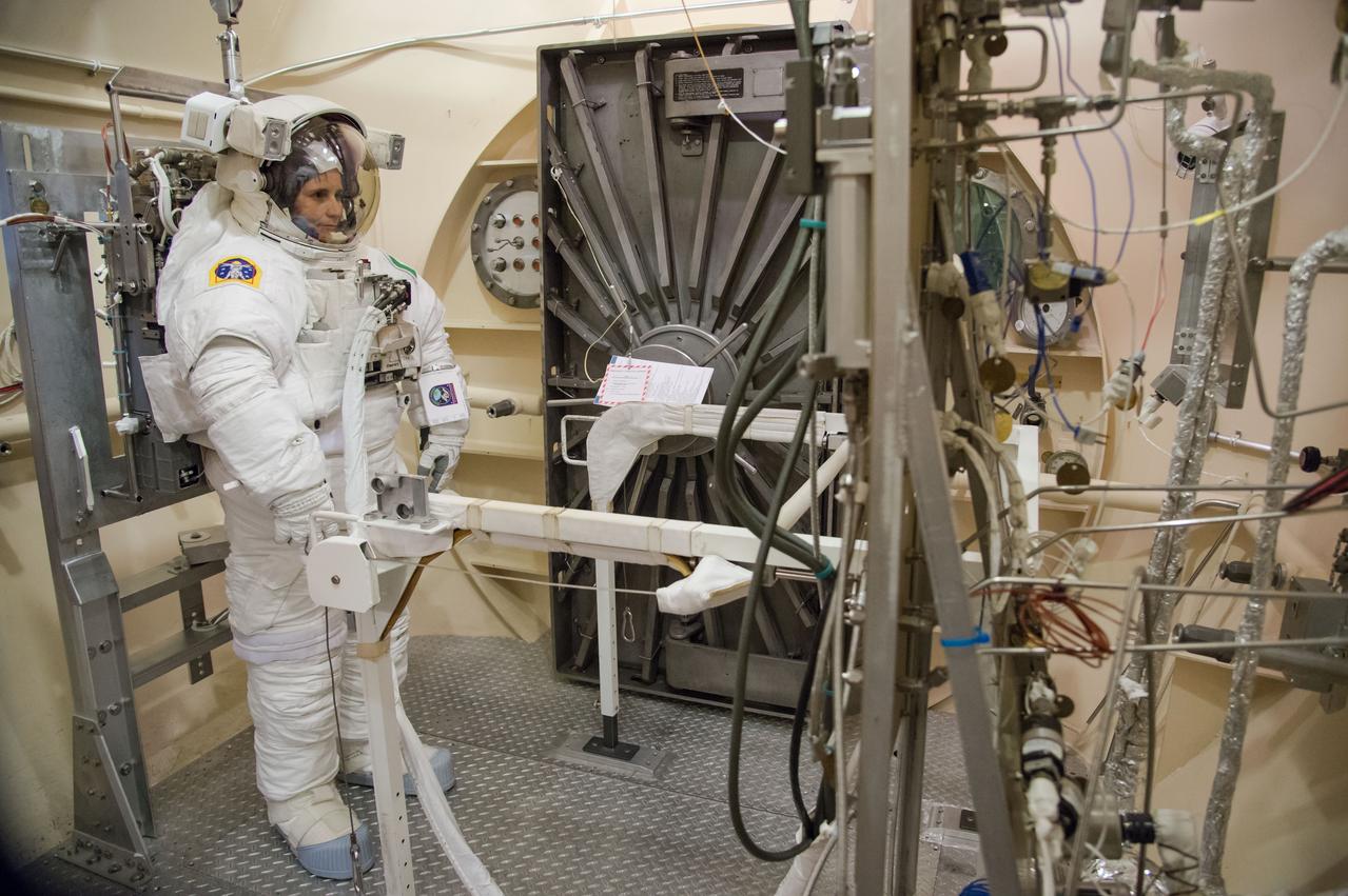 Expedition 42/43 ESA astronaut Samantha Cristoforetti during preparations for EMU Certification Altitude Run.  Photo Date: September 22, 2014.  Location: Bldg. 7, 11 foot chamber.  Photographer: Robert Markowitz  