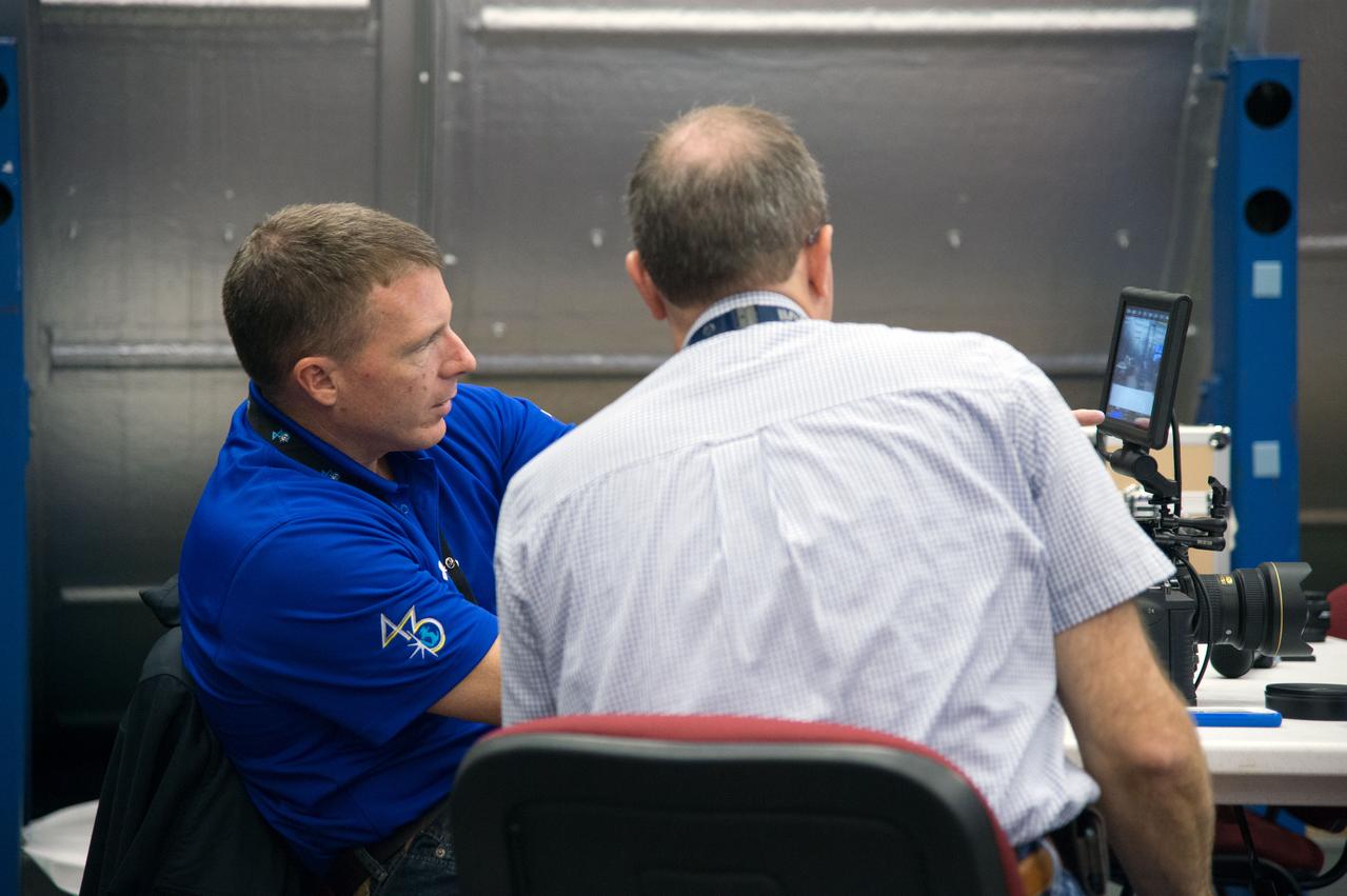PHOTO DATE:  09-26-14 LOCATION: Bldg. 9NW - ISS Mockups   SUBJECT: Expedition 43 crew member Terry Virts during Red Dragon cinema camera training with instructor Mark Turner. PHOTOGRAPHER: BILL STAFFORD