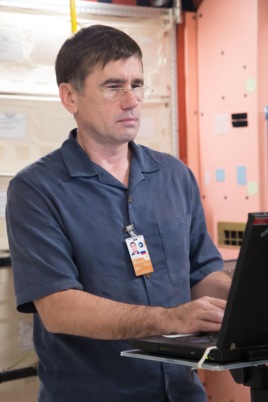 Date: 09-30-14 Location: Bldg 9NW, ISS Mockup Subject: Expedition 46/47 (Soyuz 45) crew members Tim Kopra, Timothy Peake, Yuri Malenchenko with instructor Wyatt Smith during Routine Ops training in the Space Vehicle Mockup Training Facility's ISS mockups Photographer: James Blair