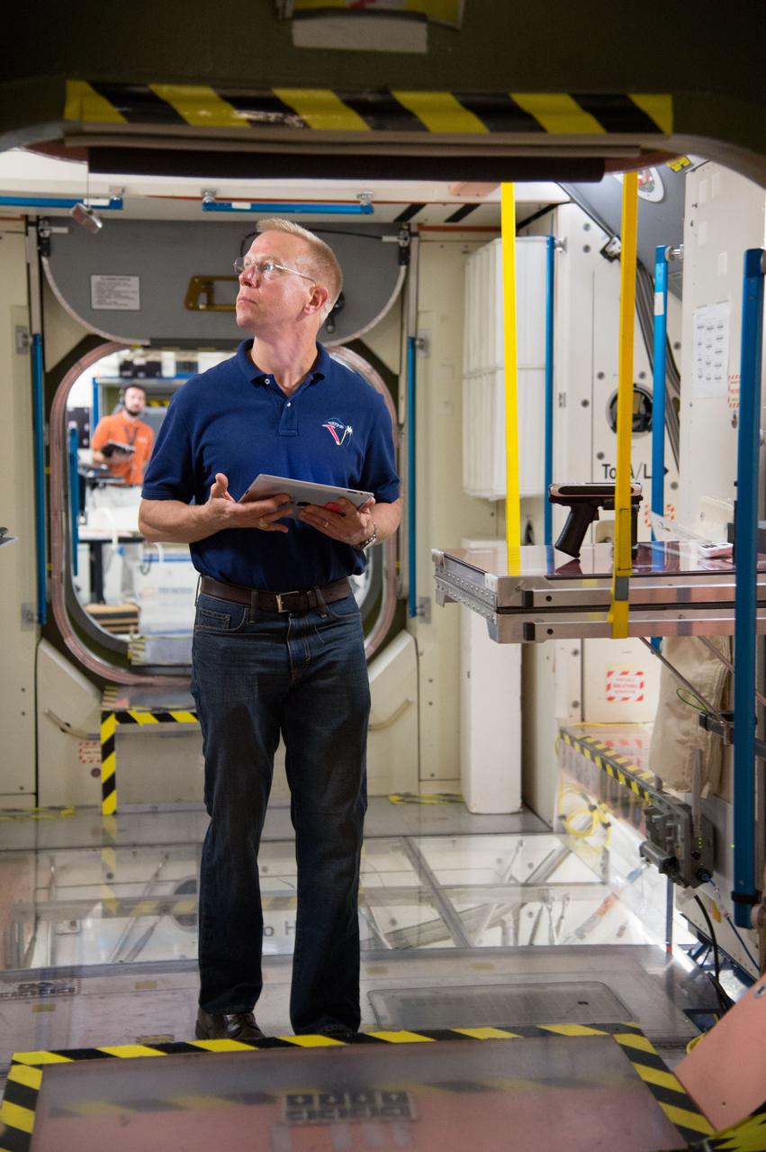 Date: 09-30-14 Location: Bldg 9NW, ISS Mockup Subject: Expedition 46/47 (Soyuz 45) crew members Tim Kopra, Timothy Peake, Yuri Malenchenko with instructor Wyatt Smith during Routine Ops training in the Space Vehicle Mockup Training Facility's ISS mockups Photographer: James Blair