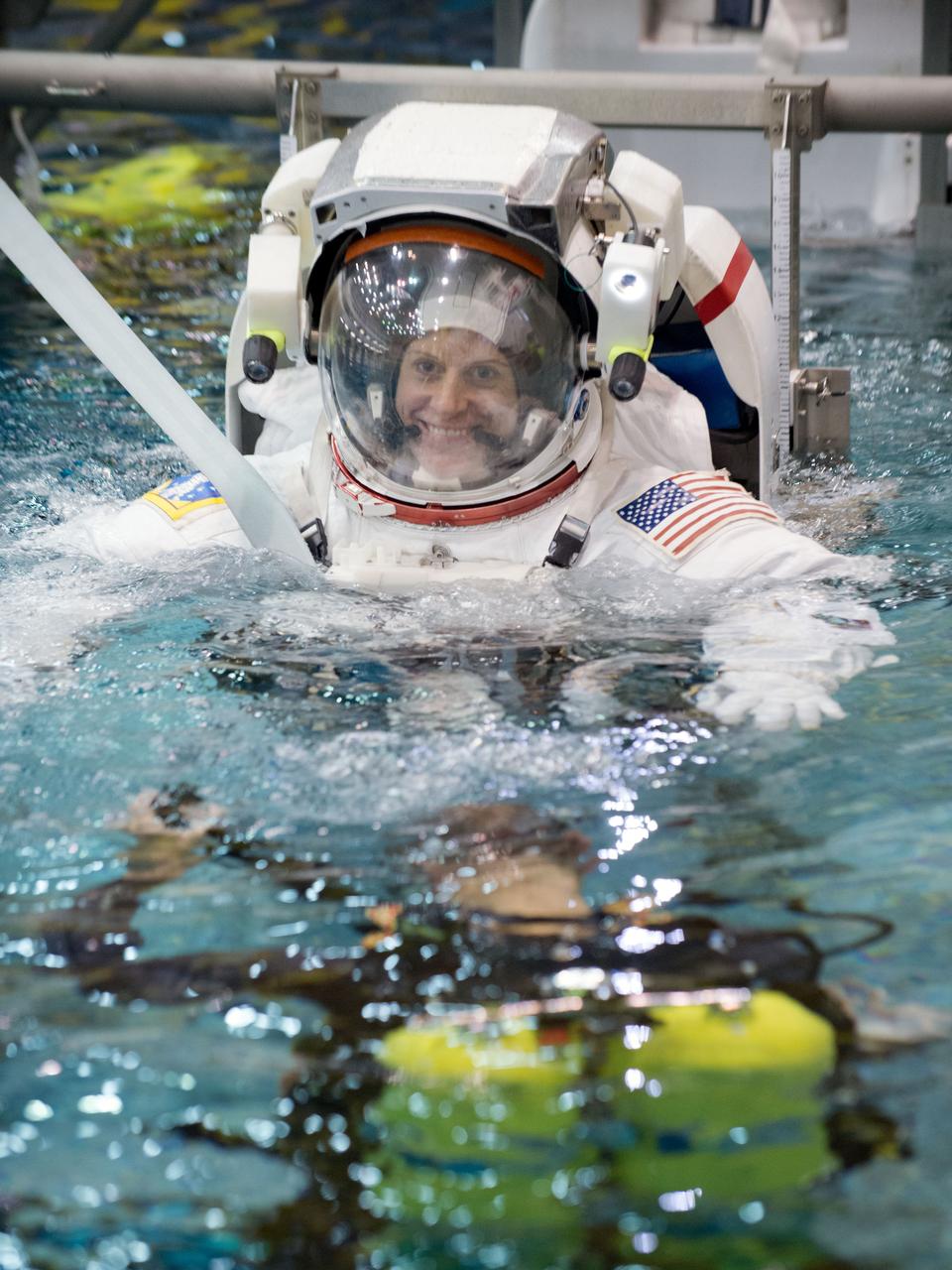 Date: 10-23-14 Location: NBL - Pool Topside Subject: Expedition 48/49 (Soyuz 47) crew members NASA astronaut Kate Rubins and JAXA astronaut Takuya Onishi during INC-47/48 ISS EVA Maintence 2 training at the NBL Photographer: James Blair