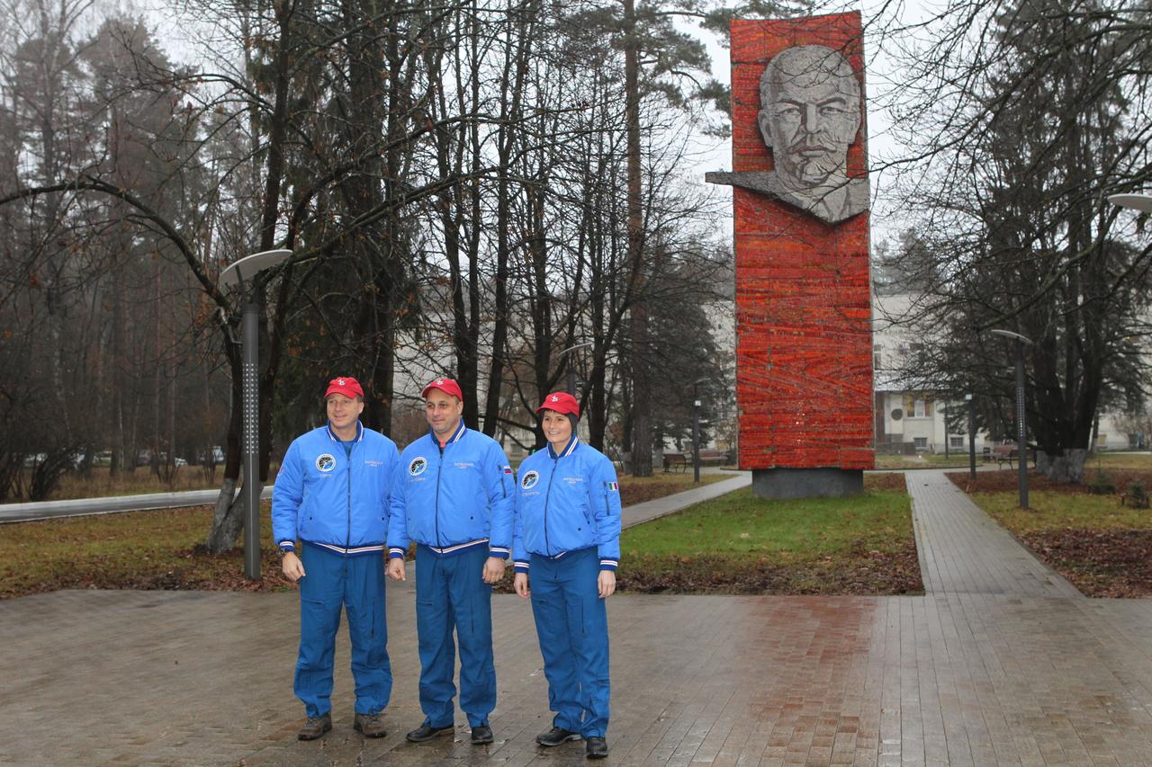 4441:  With the statue of Vladimir Lenin nearby, the Expedition 42/43 crew poses for pictures Nov. 11 at the Gagarin Cosmonaut Training Center in Star City, Russia before boarding a flight to the Baikonur Cosmodrome in Kazakhstan for final pre-launch training. From left to right are Terry Virts of NASA, Anton Shkaplerov of the Russian Federal Space Agency (Roscosmos) and Samantha Cristoforetti of the European Space Agency, who will launch Nov. 24, Kazakh time from Baikonur in their Soyuz TMA-15M spacecraft for a five and a half month mission on the International Space Station.  NASA/Stephanie Stoll 