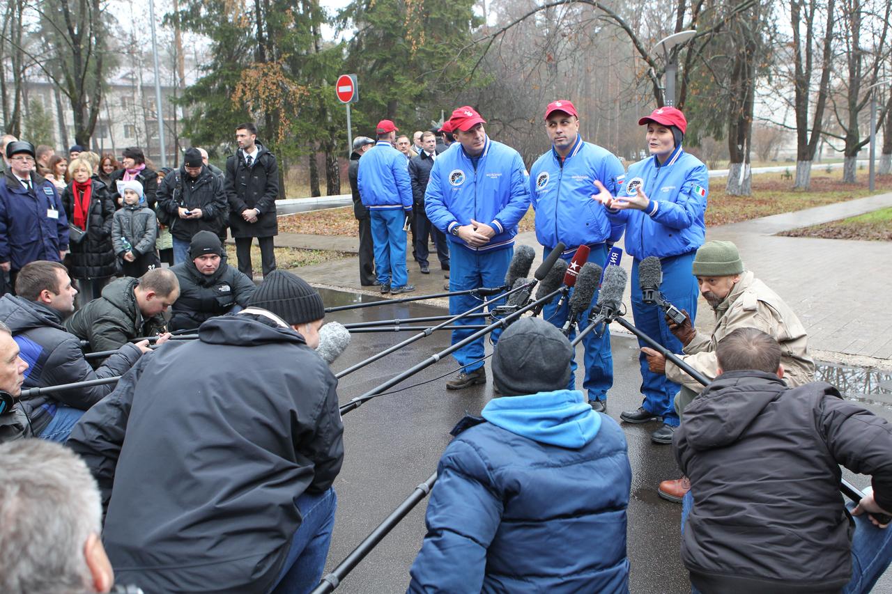 4515:  At the Gagarin Cosmonaut Training Center in Star City, Russia, Expedition 42/43 crewmember Samantha Cristoforetti of the European Space Agency (right) answers a reporter’s question Nov. 11 while her crewmates, Terry Virts of NASA (left) and Anton Shkaplerov of the Russian Federal Space Agency (Roscosmos, center) look on. Virts, Shkaplerov and Cristoforetti later flew to the Baikonur Cosmodrome in Kazakhstan where they will launch Nov. 24, Kazakh time in their Soyuz TMA-15M spacecraft for a five and a half month mission on the International Space Station.  NASA/Stephanie Stoll 