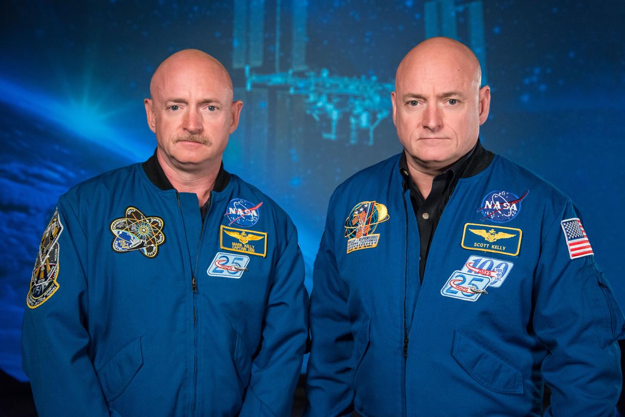 Expedition 45/46 Commander, Astronaut Scott Kelly along with his brother, former Astronaut Mark Kelly speak to news media outlets about Scott Kelly's 1-year mission aboard the International Space Station.  Photo Date: January 19, 2015.  Location: Building 2.  Photographer: Robert Markowitz