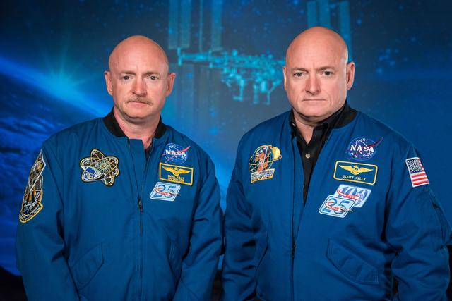 NASA image: Mark and Scott Kelly talk to news media