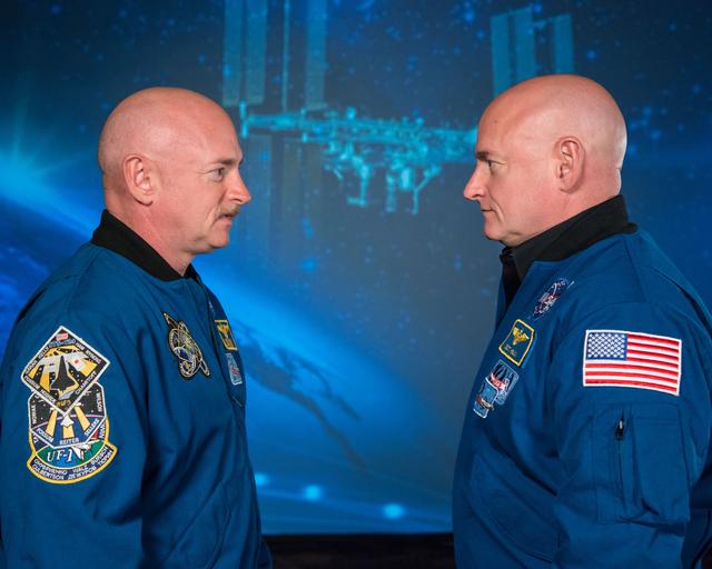 NASA image: Mark and Scott Kelly talk to news media