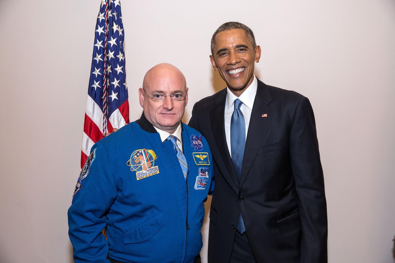 President Barack Obama greets First Lady's box guest Scott Kelly following President ObamaÕs State of the Union address at the U.S. Capitol in Washington, D.C., Jan. 20, 2015. (Official White House Photo by Pete Souza) P012015PS-1206 This official White House photograph is being made available only for publication by news organizations and/or for personal use printing by the subject(s) of the photograph. The photograph may not be manipulated in any way and may not be used in commercial or political materials, advertisements, emails, products, promotions that in any way suggests approval or endorsement of the President, the First Family, or the White House.