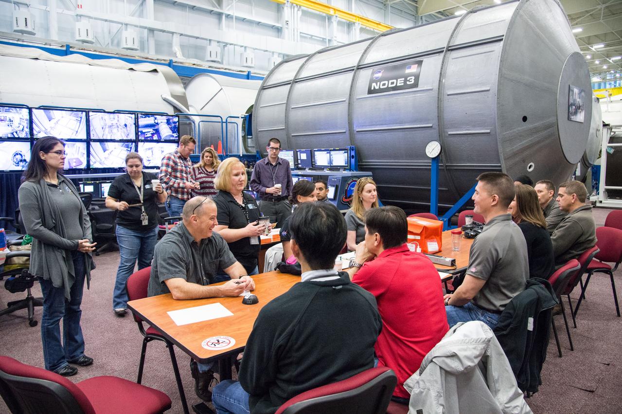 Expedition 44/45 crew members Oleg Kononenko, Kimiya Yui and Kjell Lindgren during emergency scenarios training in the ISS mockups.  Photo Date: March 11, 2015.  Location: Building 9NW - ISS Mockups.  Photographer: Robert Markowitz