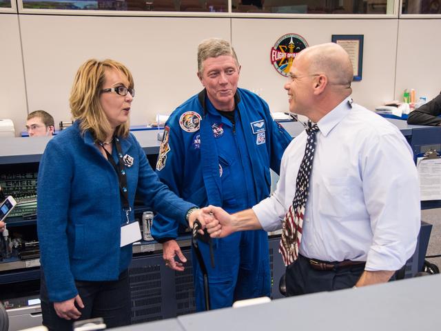 NASA image: Date: 03-27-15.Location: Bldg 30 South, FCR-1.Subject: Former Arizona Congresswoman Gabby Giffords with Astronaut Mike Fossum and JSC Center Director Ellen Ochoa.Photographer: James Blair /  NASA