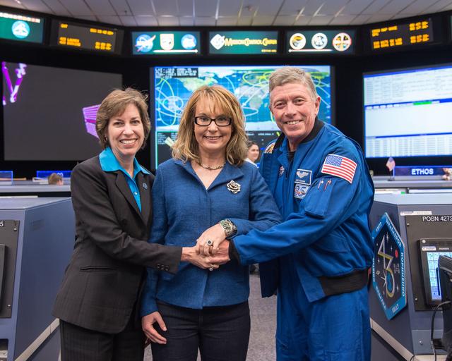 NASA image: Date: 03-27-15.Location: Bldg 30 South, FCR-1.Subject: Former Arizona Congresswoman Gabby Giffords with Astronaut Mike Fossum and JSC Center Director Ellen Ochoa.Photographer: James Blair /  NASA