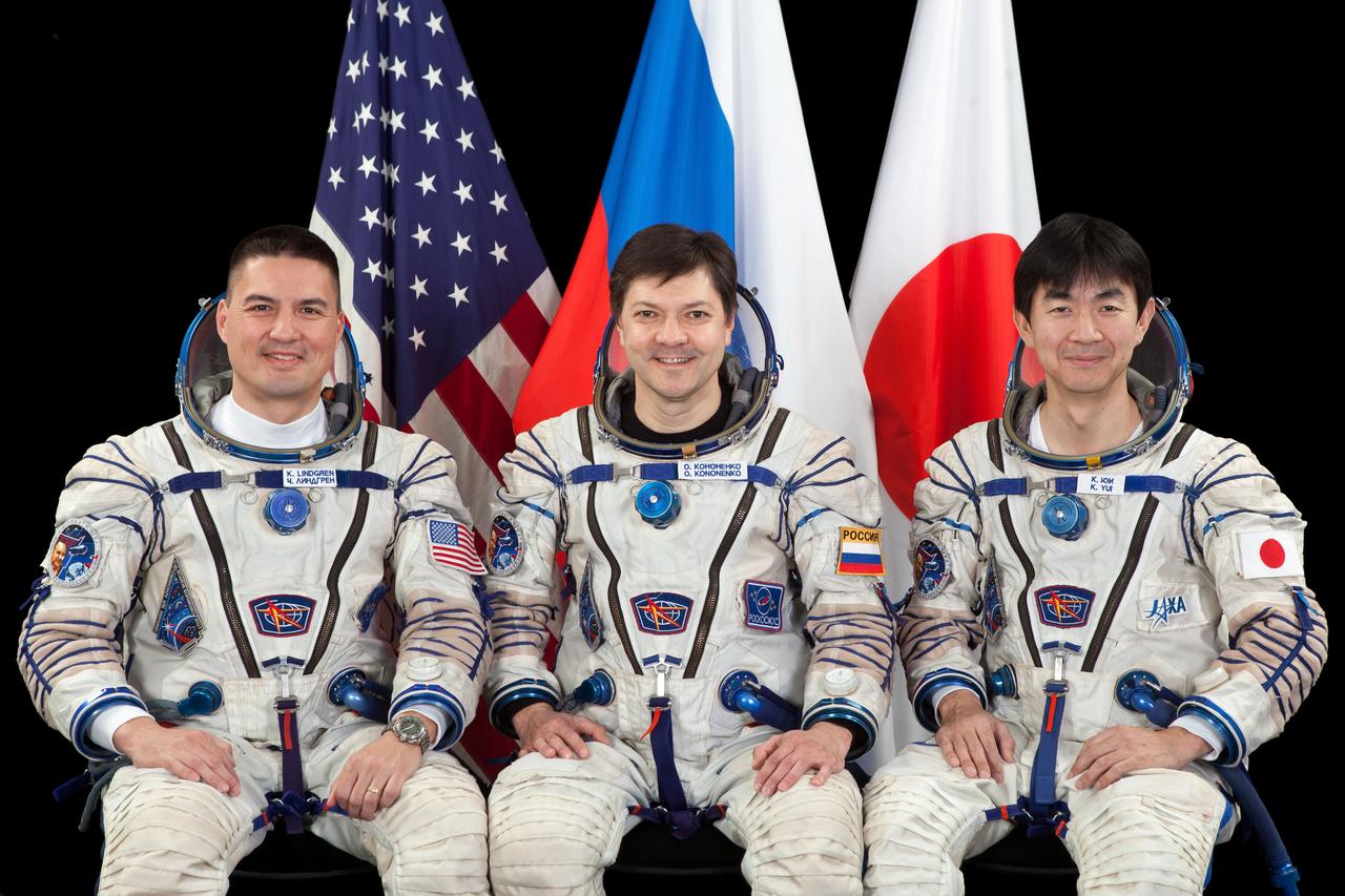 JSC2015E053687 (04/30/2015) --- Expedition 44 crew members NASA astronaut Kjell Lindgren (left), Russian cosmonaut Oleg Kononenko (center) and Japan Aerospace Exploration Agency (JAXA) astronaut Kimiya Yui.