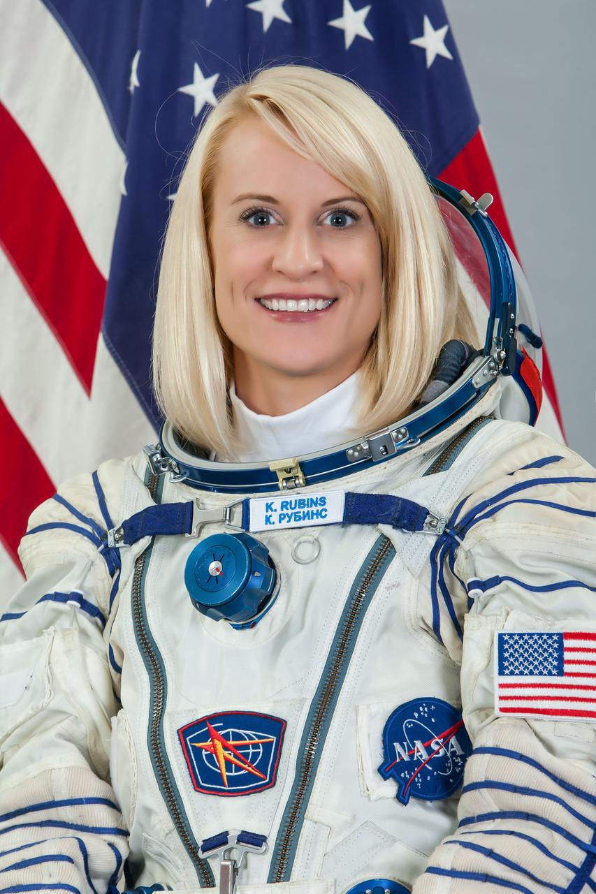 JSC2015e102005 (08/04/2015) --- Official suited portrait of Expedition 48 crew member NASA astronaut Kate Rubins wearing a Russian Sokol launch and entry suit.