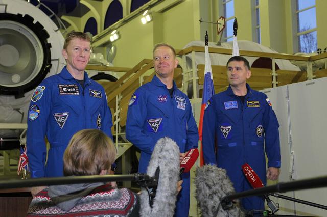 NASA image: At the Gagarin Cosmonaut Training Center in Star City, Russia, Expedition 46-47 prime crewmembers Tim Peake of the European Space Agency (left), Tim Kopra of NASA (center) and Yuri Malenchenko of the Russian Federal Space Agency (Roscosmos, right) answer reporters��� questions Nov. 19 at the start of two days of qualification exams. They will launch Dec. 15 in the Soyuz TMA-19M spacecraft from the Baikonur Cosmodrome in Kazakhstan for a six-month mission on the International Space Station..NASA/Seth Marcantel