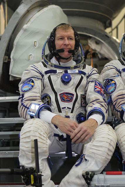 NASA image: At the Gagarin Cosmonaut Training Center in Star City, Russia, Expedition 46-47 crewmember Tim Peake of the European Space Agency listens to a reporter���s question Nov. 20 during the start of final qualification exams. Peake, Yuri Malenchenko of the Russian Federal Space Agency (Roscosmos, center) and Tim Kopra of NASA (right) will launch Dec. 15 on their Soyuz TMA-19M spacecraft Dec. 15 from the Baikonur Cosmodrome in Kazakhstan for a six-month mission on the International Space Station..NASA/Seth Marcantel