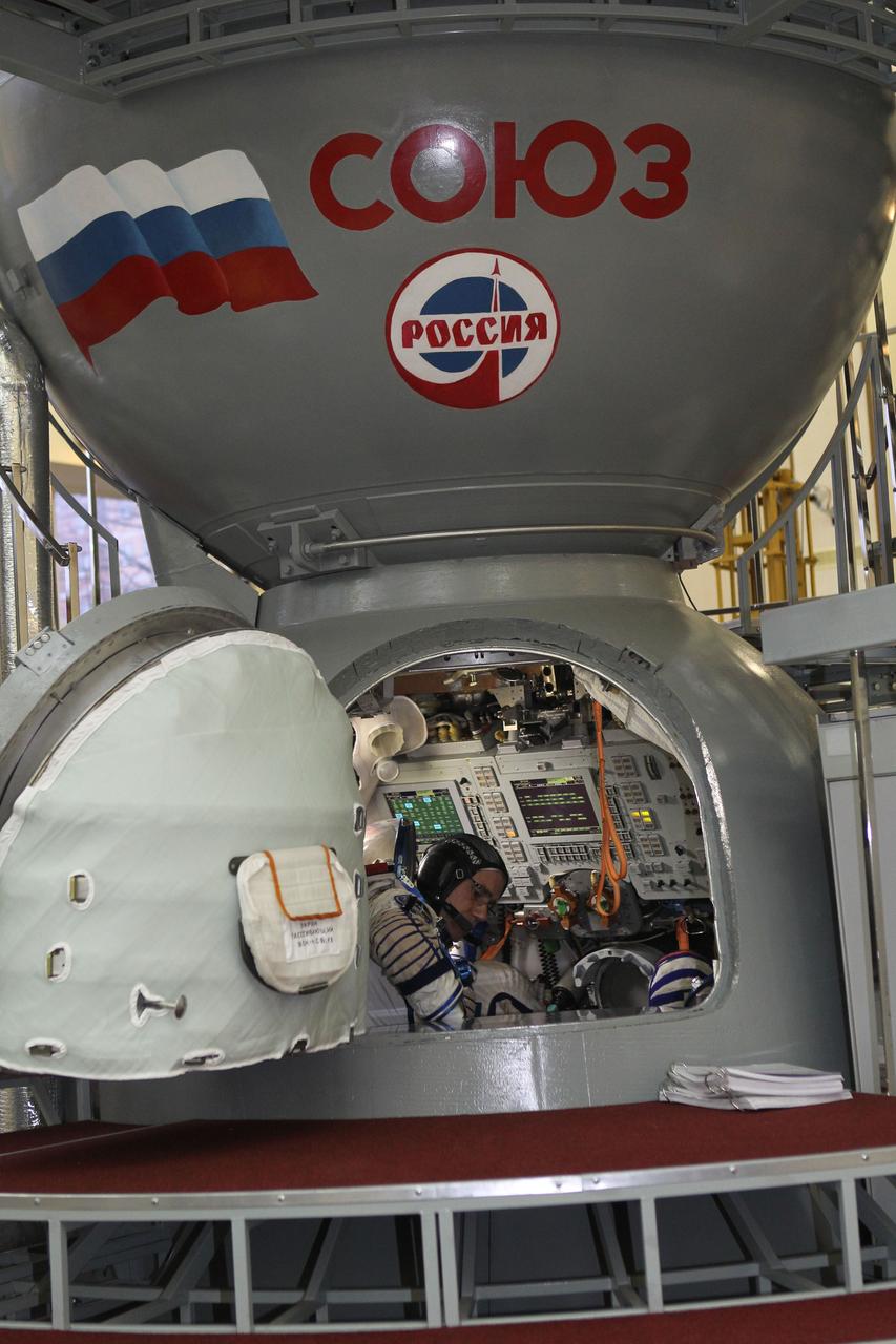 At the Gagarin Cosmonaut Training Center in Star City, Russia, Expedition 46-47 crewmember Yuri Malenchenko of the Russian Federal Space Agency (Roscosmos) reviews procedures inside a Soyuz spacecraft simulator Nov. 20 at the start of final qualification exams. Malenchenko and crewmates Tim Peake of the European Space Agency and Tim Kopra of NASA will launch Dec. 15 on their Soyuz TMA-19M spacecraft Dec. 15 from the Baikonur Cosmodrome in Kazakhstan for a six-month mission on the International Space Station. NASA/Seth Marcantel