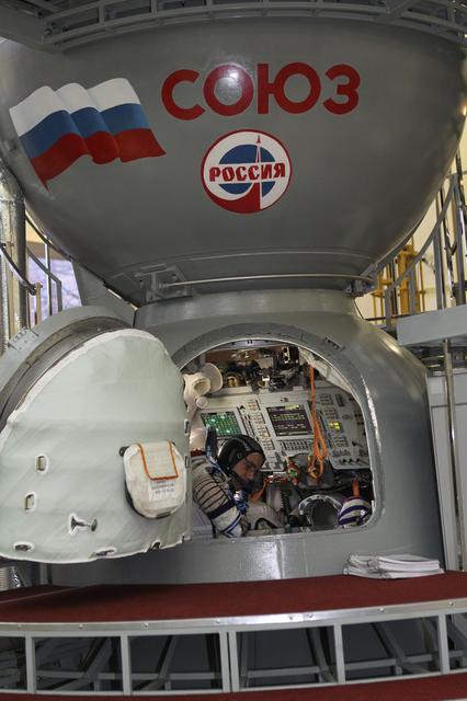 NASA image: At the Gagarin Cosmonaut Training Center in Star City, Russia, Expedition 46-47 crewmember Yuri Malenchenko of the Russian Federal Space Agency (Roscosmos) reviews procedures inside a Soyuz spacecraft simulator Nov. 20 at the start of final qualification exams. Malenchenko and crewmates Tim Peake of the European Space Agency and Tim Kopra of NASA will launch Dec. 15 on their Soyuz TMA-19M spacecraft Dec. 15 from the Baikonur Cosmodrome in Kazakhstan for a six-month mission on the International Space Station..NASA/Seth Marcantel