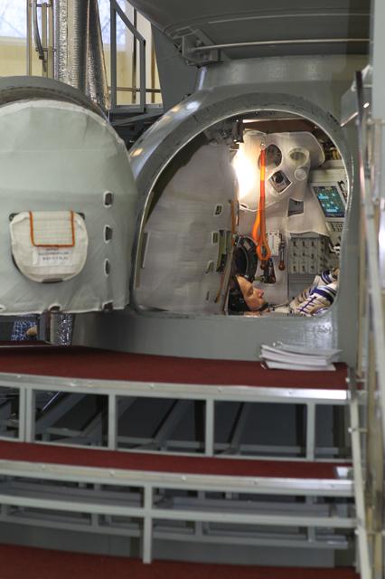 NASA image: At the Gagarin Cosmonaut Training Center in Star City, Russia, Expedition 46-47 crewmember Tim Kopra of NASA reviews procedures inside a Soyuz spacecraft simulator Nov. 20 at the start of final qualification exams. Kopra and crewmates Yuri Malenchenko of the Russian Federal Space Agency (Roscosmos) and Tim Peake of the European Space Agency will launch Dec. 15 on their Soyuz TMA-19M spacecraft Dec. 15 from the Baikonur Cosmodrome in Kazakhstan for a six-month mission on the International Space Station..NASA/Seth Marcantel
