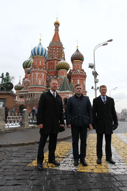 NASA image: With St. Basil���s Cathedral in Red Square in Moscow serving as a backdrop, Expedition 46-47 crewmembers Tim Kopra of NASA (left), Yuri Malenchenko of the Russian Federal Space Agency (Roscosmos, center) and Tim Peake of the European Space Agency (right) pose for pictures Nov. 23 after laying flowers at the Kremlin Wall where Russian space icons are interred. Peake, Malenchenko and Kopra will launch on Dec. 15 on the Soyuz TMA-19M spacecraft from the Baikonur Cosmodrome in Kazakhstan for a six-month mission on the International Space Station..NASA/Seth Marcantel