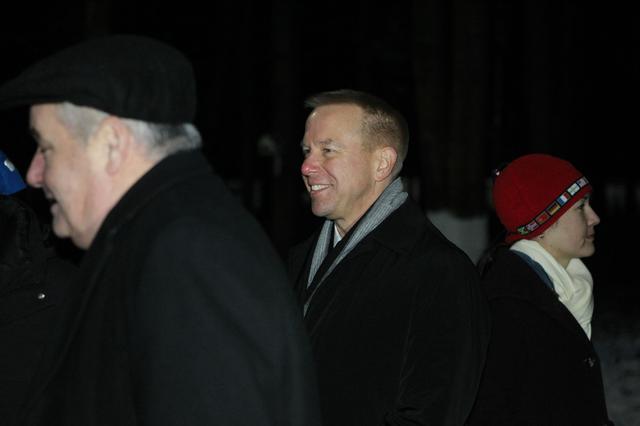 NASA image: At the Gagarin Cosmonaut Training Center in Star City, Russia, Expedition 46-47 crewmember Tim Kopra of NASA flashes a smile Nov. 30 in advance of his departure for his launch site at the Baikonur Cosmodrome in Kazakhstan. Kopra, Tim Peake of the European Space Agency and Yuri Malenchenko of the Russian Federal Space Agency (Roscosmos) will launch Dec. 15 in their Soyuz TMA-19M spacecraft for a six-month mission on the International Space Station..NASA / Seth Marcantel