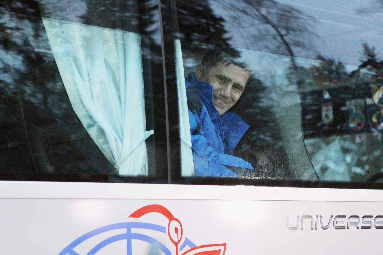 At the Gagarin Cosmonaut Training Center in Star City, Russia, Expedition 46-47 crewmember Yuri Malenchenko of the Russian Federal Space Agency (Roscosmos) flashes a smile Nov. 30 as he departs for the airport and the flight to his launch site at the Baikonur Cosmodrome in Kazakhstan. Malenchenko, Tim Kopra of NASA and Tim Peake of the European Space Agency will launch Dec. 15 in the Soyuz TMA-19M spacecraft for a six-month mission on the International Space Station. NASA / Seth Marcantel