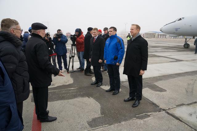 NASA image: The Expedition 46-47 crewmembers arrive in Baikonur, Kazakhstan Nov. 30 for final pre-launch training following a flight from their training base at the Gagarin Cosmonaut Training Center in Star City, Russia. On the right of the frame are Tim Peake of the European Space Agency (left), Yuri Malenchenko of the Russian Federal Space Agency (Roscosmos, center) and Tim Kopra of NASA (right), who will launch Dec. 15 on the Soyuz TMA-19M spacecraft for a six-month mission on the International Space Station...NASA / Victor Zelentsov.