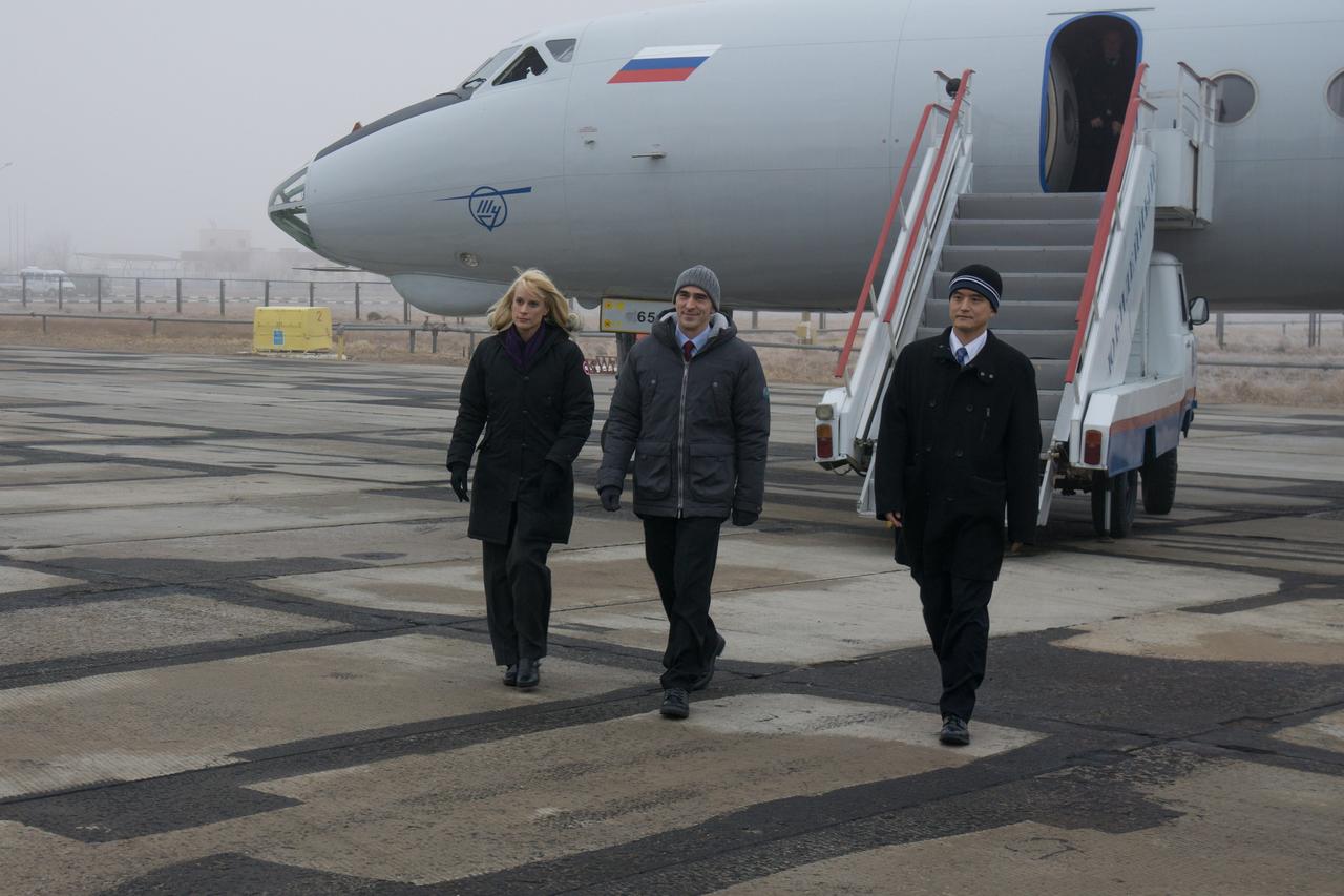 The Expedition 46-47 backup crewmembers arrive in Baikonur, Kazakhstan Nov. 30 for final pre-launch preparations. Kate Rubins of NASA (left), Anatoly Ivanishin of the Russian Federal Space Agency (Roscosmos, center) and Takuya Onishi of the Japan Aerospace Exploration Agency (JAXA, right) will serve as backups to the prime crewmembers, Tim Peake of the European Space Agency, Yuri Malenchenko of the Russian Federal Space Agency (Roscosmos) and Tim Kopra of NASA, who will launch Dec. 15 on the Soyuz TMA-19M spacecraft for a six-month mission on the International Space Station.  NASA / Victor Zelentsov 