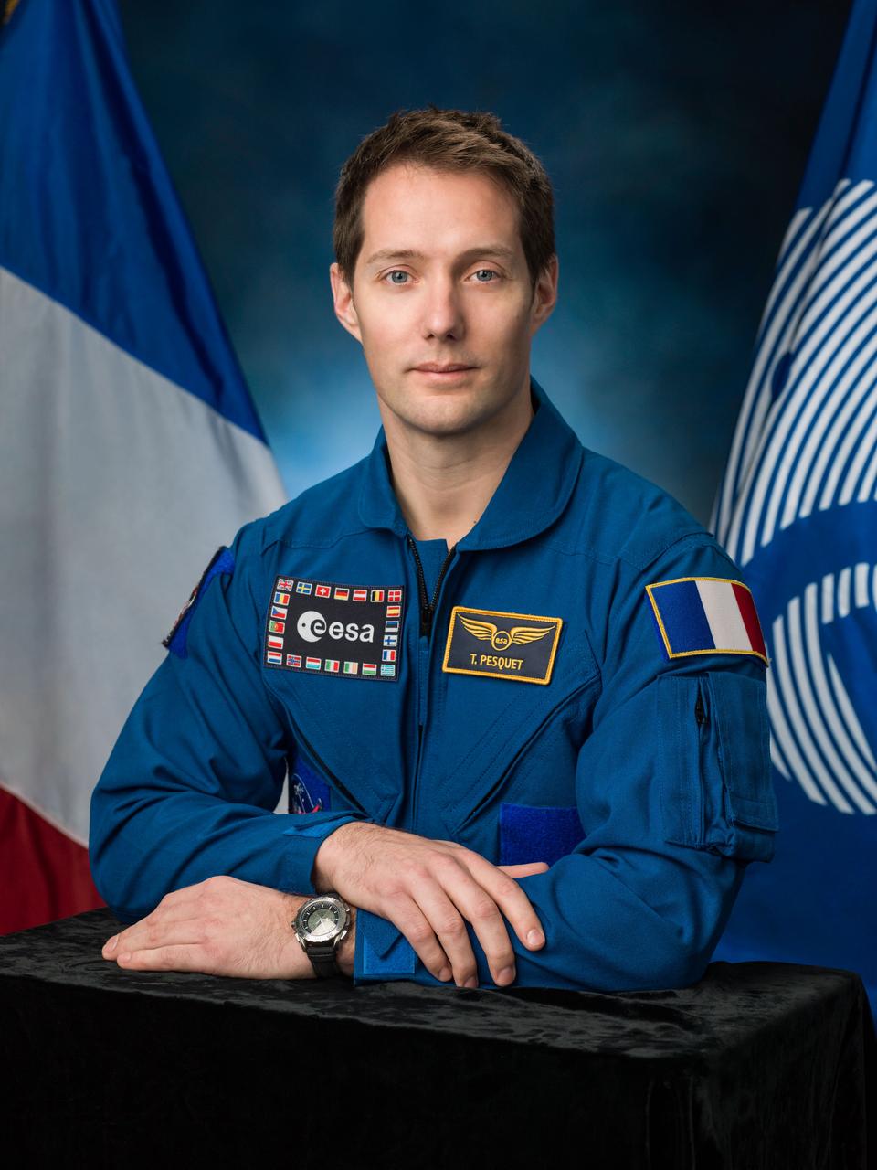 PHOTO DATE: 01-14-16 LOCATION: Bldg. 8, Room 183 - Photo Studio SUBJECT: Official portrait of ESA astronaut & Expedition 50/51 crew member Thomas Pesquet in blue flight suit. PHOTOGRAPHER: BILL STAFFORD