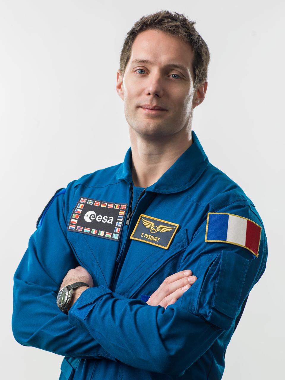 PHOTO DATE: 01-14-16 LOCATION: Bldg. 8, Room 183 - Photo Studio SUBJECT: Official portrait of ESA astronaut & Expedition 50/51 crew member Thomas Pesquet in blue flight suit. PHOTOGRAPHER: BILL STAFFORD