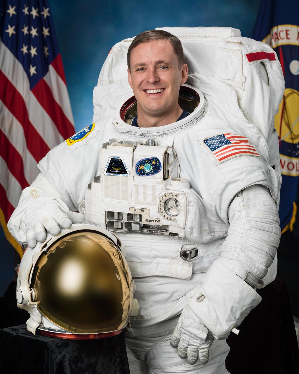 Official Astronaut Portrait of Jack Fischer in an EMU.  Photo Date: February 25, 2016.  Location: Building 8, Room 183 - Photo Studio.  Photographer: Robert Markowitz
