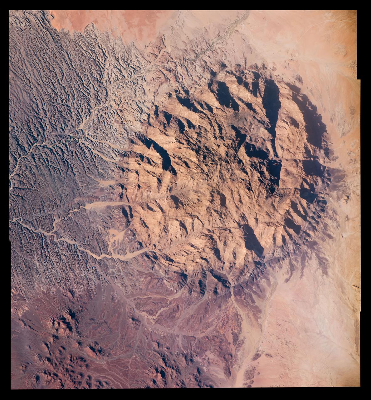 Expedition 47 Earth observation composite created with iss047e028742 - iss047e028744 135A2099 – 135A2101 Unique structure in Namibia Mt Brandberg Nature Reserve