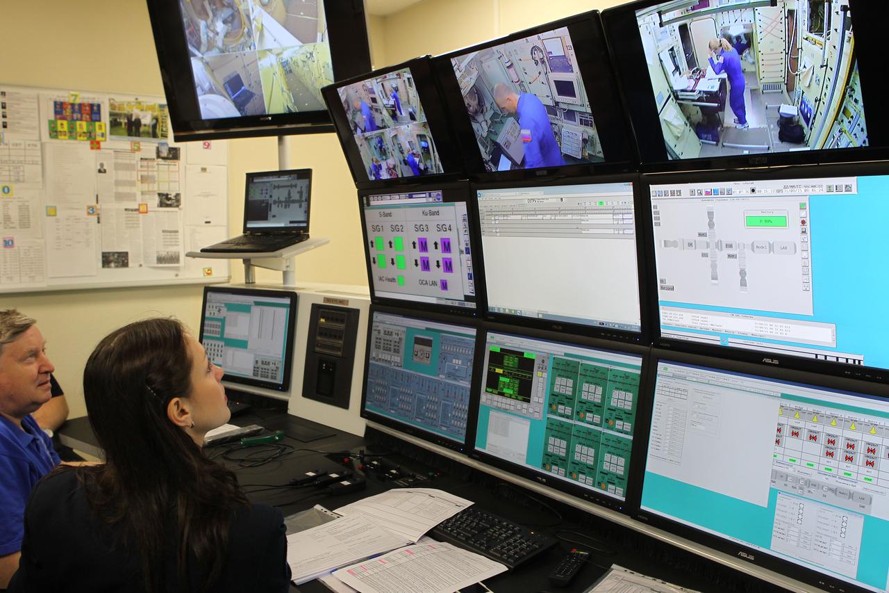 At the Gagarin Cosmonaut Training Center in Star City, Russia, training instructors monitor the work of Expedition 48-49 prime crewmembers Kate Rubins of NASA, Takuya Onishi of the Japan Aerospace Exploration Agency and Anatoly Ivanishin of Roscosmos during final qualification exams May 26. Rubins, Onishi and Ivanishin will launch June 24 on the Soyuz MS-01 spacecraft from the Baikonur Cosmodrome in Kazakhstan for a four-month mission on the International Space Station.  NASA/Stephanie Stoll 