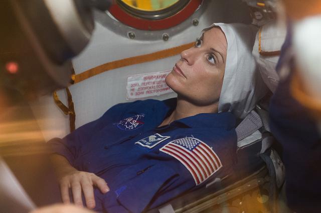 SHL_9836-1:..In the Integration Facility at the Baikonur Cosmodrome in Kazakhstan, Expedition 48-49 crewmember Kate Rubins of NASA conducts a �ޔfit check��� familiarization aboard the Soyuz MS-01 spacecraft June 25 as part of the preparations for launch with Anatoly Ivanishin of Roscosmos and Takuya Onishi of the Japan Aerospace Exploration Agency on July 7, Baikonur time for a planned four-month mission on the International Space Station...GCTC/Andrei Shelepin.