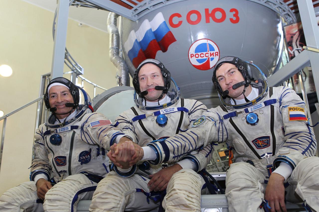 At the Gagarin Cosmonaut Training Center in Star City, Russia, Expedition 49-50 backup crewmembers Mark Vande Hei of NASA (left) and Alexander Misurkin (center) and Nikolai Tikhonov (right) of Roscosmos pose for pictures Aug. 30 at the start of final qualification exams. They are serving as backups to prime crewmembers Shane Kimbrough of NASA and Andrey Borisenko and Sergey Ryzhikov of Roscosmos who will launch on Sept. 24 (Kazakh time) on their Soyuz MS-02 vehicle from the Baikonur Cosmodrome in Kazakhstan for a five-month mission on the International Space Station. NASA/Stephanie Stoll