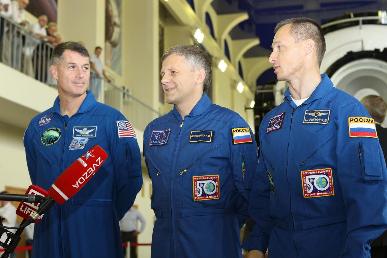 At the Gagarin Cosmonaut Training Center in Star City, Russia, Expedition 49-50 prime crewmembers Shane Kimbrough of NASA (left) and Andrey Borisenko (center) and Sergey Ryzhikov (right) of Roscosmos respond to reporters questions Aug. 30 at the start of two days of final qualification exams. The trio is preparing for launch on Sept. 24 (Kazakh time) on their Soyuz MS-02 vehicle from the Baikonur Cosmodrome in Kazakhstan for a five-month mission on the International Space Station. NASA/Stephanie Stoll